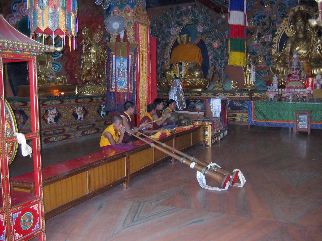 15-Monks blowing the horn in the Boutnath Monastry.jpg - Monks blowing the horn in the Boutnath Monastry